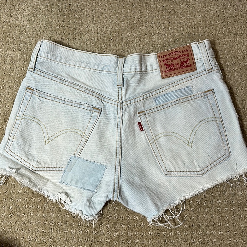 Light wash patchwork Levi’s shorts
